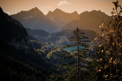 Castle neuschwanstein in front of lake alp in bavaria