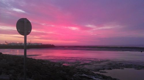 Scenic view of sea at sunset