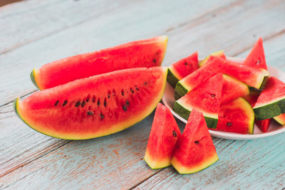 Close-up of chopped fruits on table