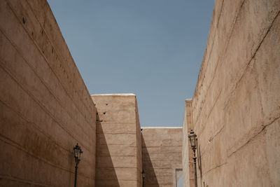 Low angle view of building against blue sky