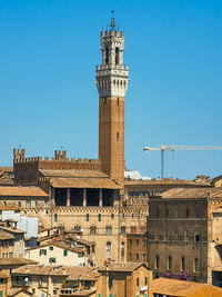 Cityscape of siena a wonderful city in tuscany and its medieval buildings seen from orto dei tolomei