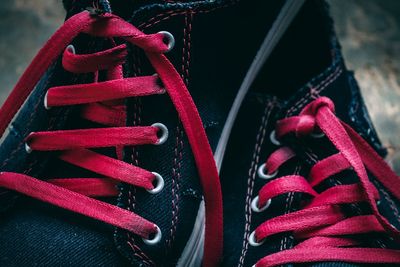 High angle view of red shoes on snow