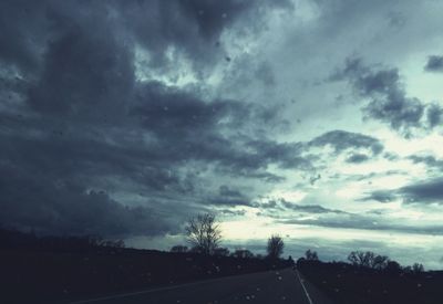 View of road against cloudy sky