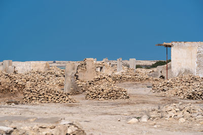 Old ruins against clear blue sky