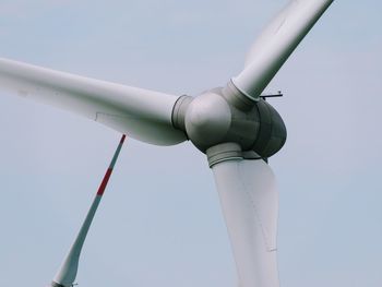 Low angle view of airplane against clear sky