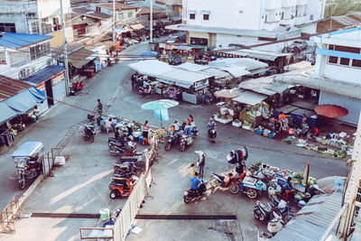 High angle view of people on street market