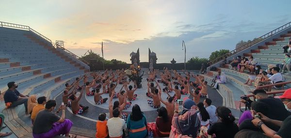 Panoramic view of people on street against sky