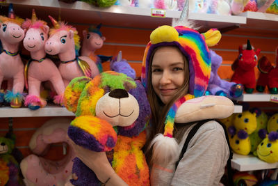 Portrait of woman with toy toys