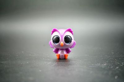 Close-up of toy figurine on table