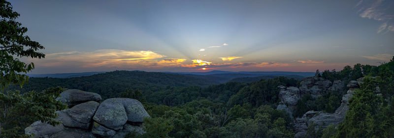 Scenic view of landscape against sky during sunset