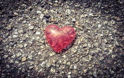 Close-up of red heart shape on table