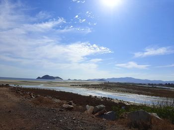 Scenic view of beach against sky