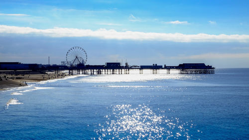 Pier on sea against sky