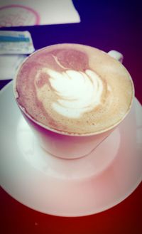 Close-up of cappuccino on table