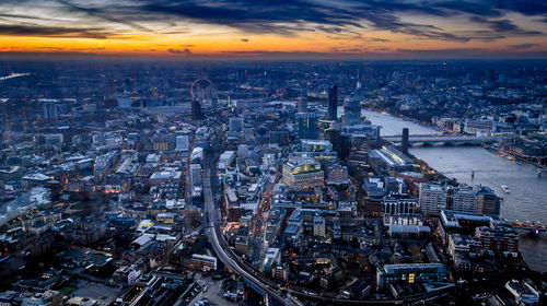 High angle view of city at sunset