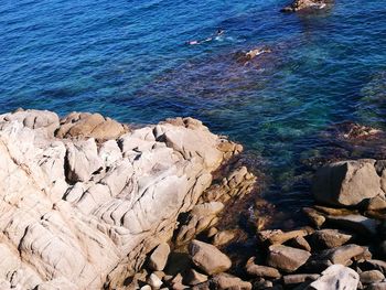 High angle view of rocks on beach