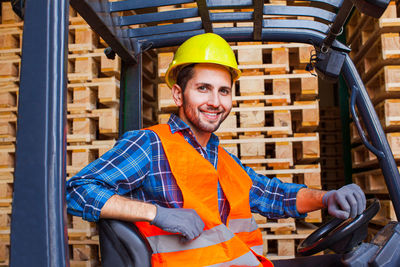 Portrait of man working at construction site