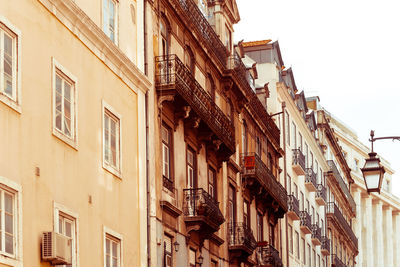 Low angle view of built structures against sky