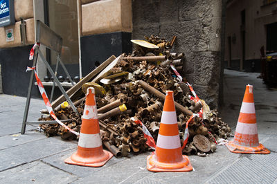 Garbage on street against buildings