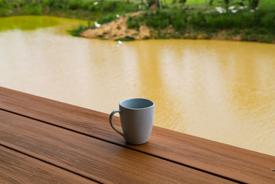 Close-up of coffee cup on table