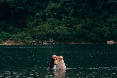 Man swimming in lake