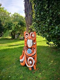 View of mannequin on tree in park