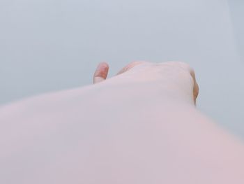 Low angle view of rock against clear sky