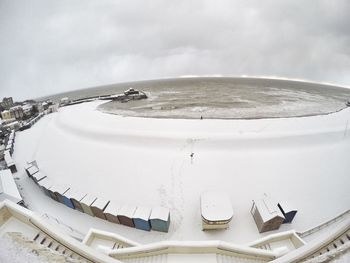 High angle view of sea against sky during winter