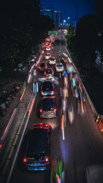 High angle view of light trails on city street