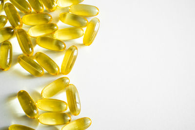 Close-up of pills on white background