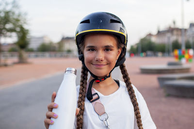 Side view of boy standing on road