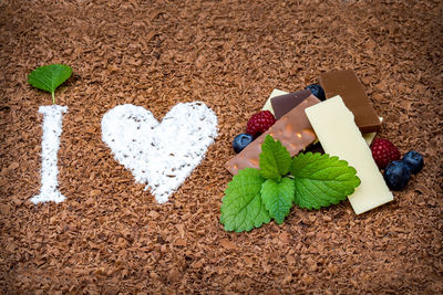 High angle view of "i love chocolate" written in chocolate