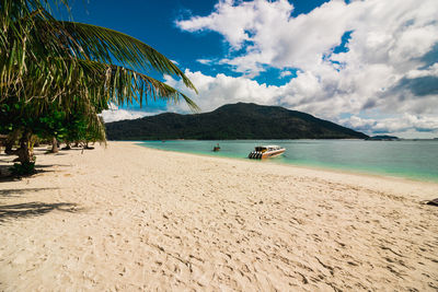 Scenic view of beach against sky