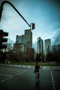 City street and modern buildings against sky