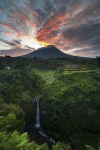 Scenic view of mountains against sky during sunrise