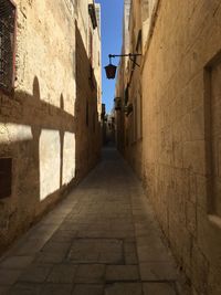 Narrow alley along buildings