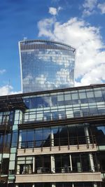 Low angle view of modern building against clear sky