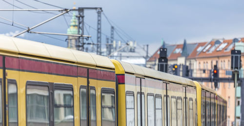 Close-up of train against sky