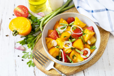 High angle view of salad in bowl on table