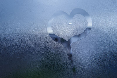 Heart shape on glass window
