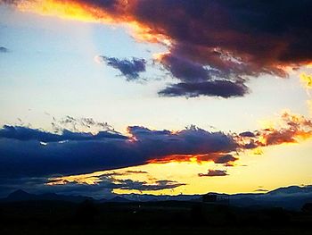 Scenic view of dramatic sky during sunset