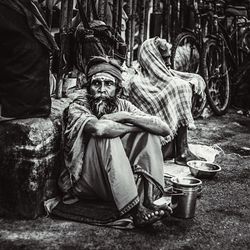 Portrait of people sitting on motorcycle