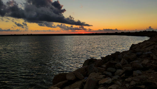 Scenic view of sea against sky during sunset