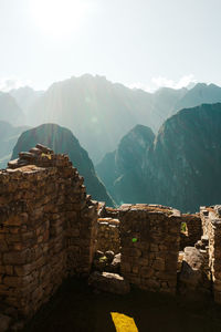 Machu picchu old inca ruins at sunrise in peru