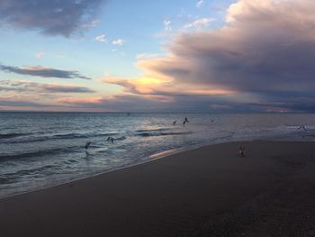 Scenic view of sea against sky at sunset