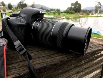 Close-up of camera on table