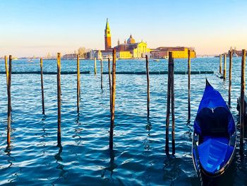 Wooden posts in grand canal