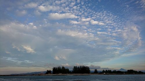 Scenic view of sea against sky at sunset