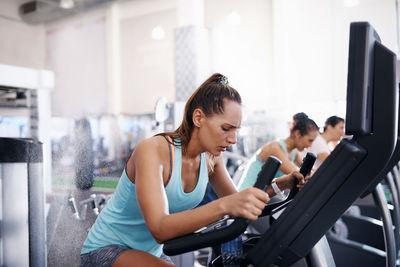 Females exercising at gym