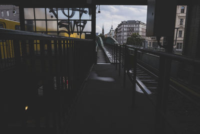 View of bridge in city against sky